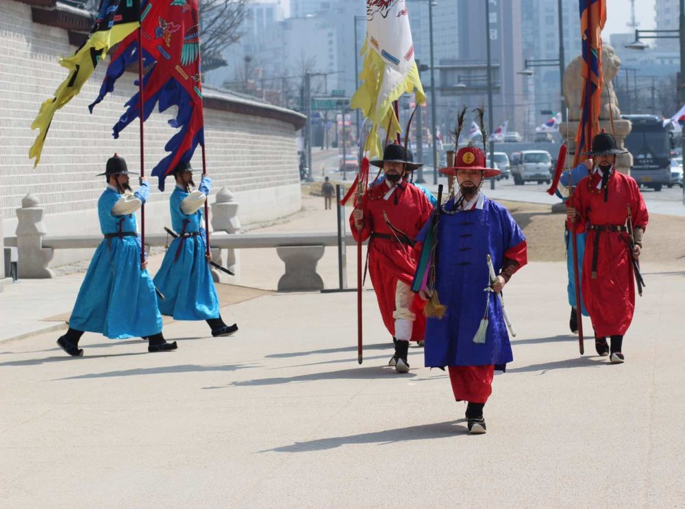 changing of the guards at gyeongbokgung in seoul, south korea