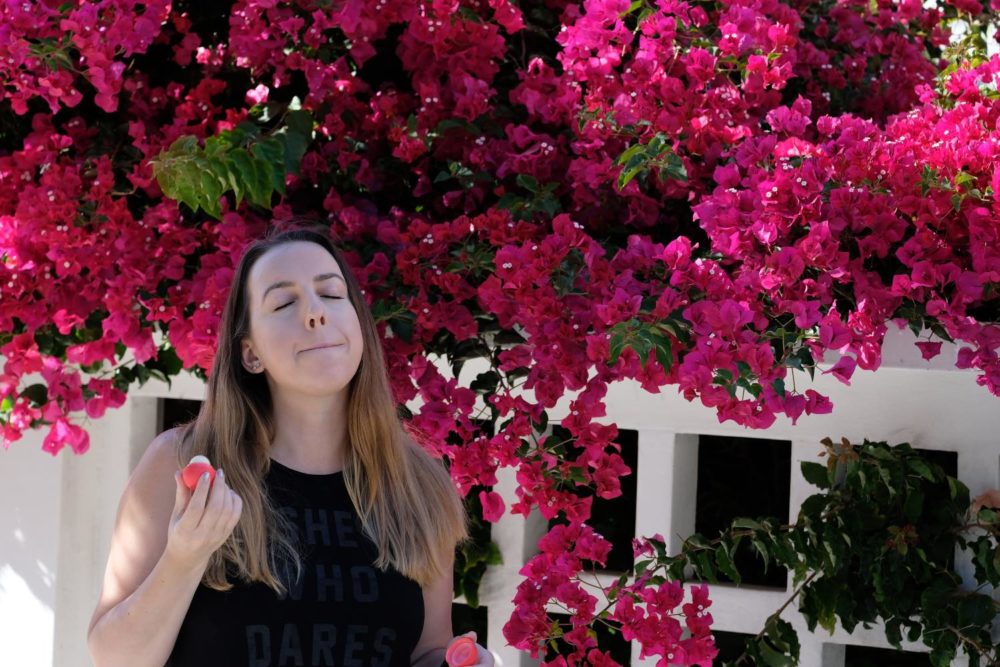 eos lip balm and bougainvillea flowers